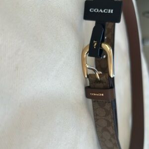 New with tags Coach belt - size small,
Measures 35 inches long